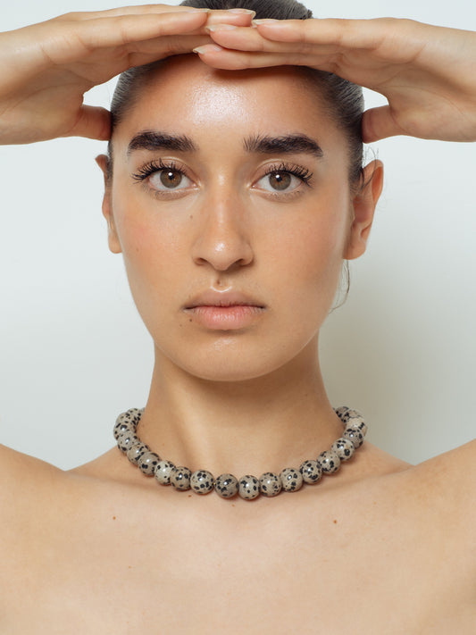 The Digital Shield: How a Dalmatian Jasper Necklace Filters 2026’s "Social Static"